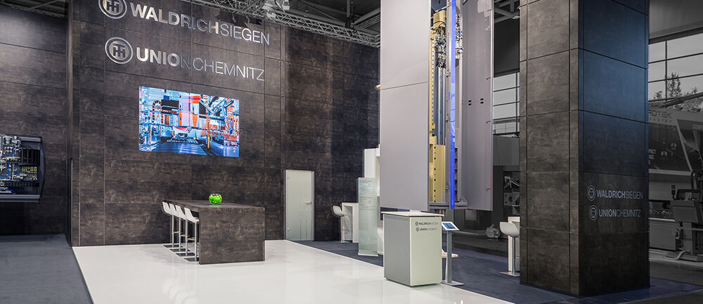 Messestand Waldrichsiegen, UnionChemnitz, Messe EMO, Messebau ISINGERMERZ, Messedesign
