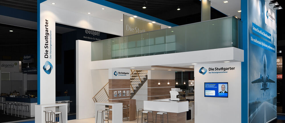 Messestand Stuttgarter Versicherung, Messe DKM, Dortmund, Messebau ISINGERMERZ, Messekonzept
