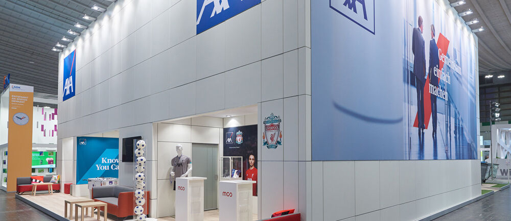 Messestand AXA, Messe DKM, Versicherungsbranche, Isingermerz, Messebau, Messedesign, zweigeschossig, Doppelstock, Markenraum