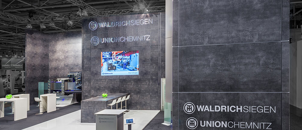 Messestand Waldrichsiegen, UnionChemnitz, Messe EMO, Messebau ISINGERMERZ, Messedesign
