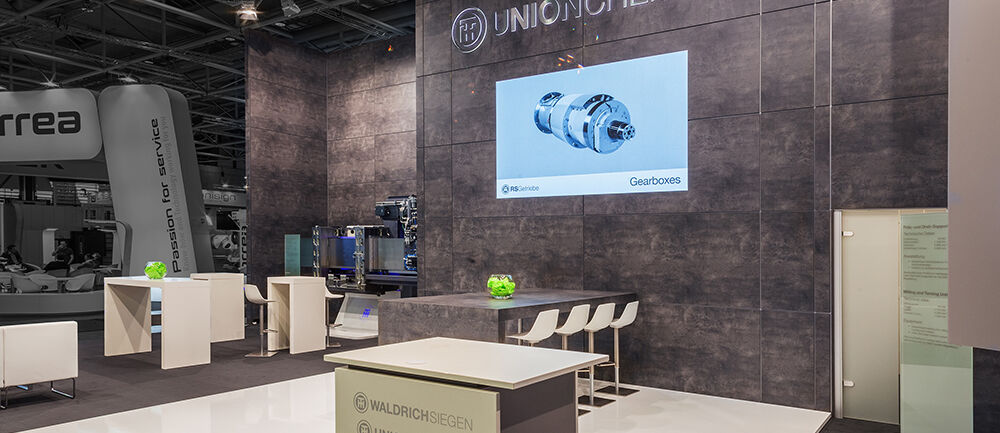 Messestand Waldrichsiegen, UnionChemnitz, Messe EMO, Messebau ISINGERMERZ, Messestandgestaltung