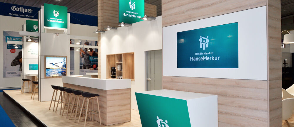 Messestand Hanse Merkur, Messe DKM, Dortmund, Messebau ISINGERMERZ, Messestanddesign